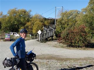 Photo of Tour Aotearoa 2024: rider Shane J, Hawea river swing bridge