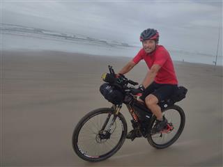 Photo of Tour Aotearoa 2024: rider Stephane Perron, 90 miles beach