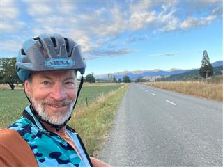Photo of Tour Aotearoa 2023: rider Rich Truax, Morning roll out of Tapawera (Hop Valley